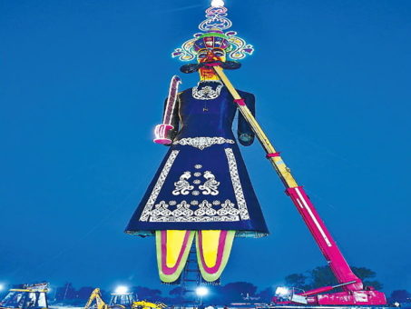 In nearly 12-hour effort, the country’s largest 221 feet high Ravana, stood up on Thursday
